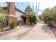 Brick home with long driveway, offering ample parking space at 2166 E Caroline Ln, Tempe, AZ 85284