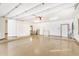 Bright and clean garage featuring built-in storage and a finished floor at 2166 E Caroline Ln, Tempe, AZ 85284