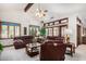 Spacious Gathering room with leather sofas and plenty of natural light at 2166 E Caroline Ln, Tempe, AZ 85284