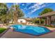 Stunning pool and spa with a waterfall feature in a desert setting at 2166 E Caroline Ln, Tempe, AZ 85284