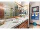 Bathroom with tiled floors, a large vanity, and a walk-in shower at 2166 E Caroline Ln, Tempe, AZ 85284