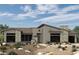 Single-story home with stone accents and desert landscaping at 24450 N 132Nd Pl, Scottsdale, AZ 85255
