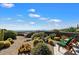 Desert landscape patio with seating and stunning mountain views at 11155 E Honda Bow Rd, Scottsdale, AZ 85262