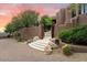 Elegant entryway with a unique gate and stone steps at 11155 E Honda Bow Rd, Scottsdale, AZ 85262