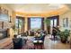 Spacious living room with fireplace and mountain views at 11155 E Honda Bow Rd, Scottsdale, AZ 85262