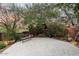 Peaceful patio area with a stone bench and desert landscaping at 11155 E Honda Bow Rd, Scottsdale, AZ 85262