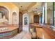 Elegant bathroom with and sinks and a large soaking tub at 11155 E Honda Bow Rd, Scottsdale, AZ 85262