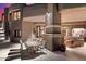 Outdoor patio with a dining area and built-in barbecue at 11155 E Honda Bow Rd, Scottsdale, AZ 85262