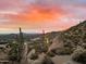 Spectacular panoramic mountain and city views at sunset at 11155 E Honda Bow Rd, Scottsdale, AZ 85262