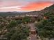 Hilltop home with a long driveway and mountain views at 11155 E Honda Bow Rd, Scottsdale, AZ 85262