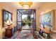 Elegant entryway with ornate doors and rich decor at 11155 E Honda Bow Rd, Scottsdale, AZ 85262
