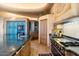 Modern kitchen with stainless steel appliances and a large center island at 11155 E Honda Bow Rd, Scottsdale, AZ 85262