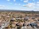 Aerial view showcasing a house with a pool and surrounding desert landscape at 265 Shawnee Dr, Wickenburg, AZ 85390