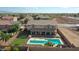 House with pool and putting green, viewed from above at 19428 W Colter St, Litchfield Park, AZ 85340