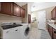 Laundry room with washer, dryer, and ample cabinetry at 19428 W Colter St, Litchfield Park, AZ 85340
