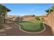 Private putting green in backyard, perfect for practice at 19428 W Colter St, Litchfield Park, AZ 85340