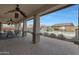 Spacious patio with seating area and a view of the pool and mountains at 19428 W Colter St, Litchfield Park, AZ 85340