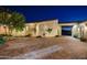 Elegant courtyard entry with paver stones and drought-tolerant landscaping at 18610 W Porter Dr # 93, Goodyear, AZ 85338