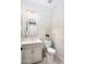 Stylish powder room with updated vanity and fixtures at 18610 W Porter Dr # 93, Goodyear, AZ 85338