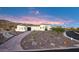Beautiful Spanish-style home nestled on a hillside with a brick pathway at 18610 W Porter Dr # 93, Goodyear, AZ 85338