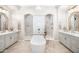 Luxurious bathroom with double vanity, soaking tub, and large shower at 18610 W Porter Dr # 93, Goodyear, AZ 85338