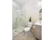 Elegant bathroom with a marble shower and modern vanity at 18610 W Porter Dr # 93, Goodyear, AZ 85338