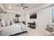 Relaxing bedroom with private access to a courtyard and a ceiling fan at 18610 W Porter Dr # 93, Goodyear, AZ 85338