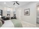Spacious bedroom with sitting area and ensuite bathroom access at 18610 W Porter Dr # 93, Goodyear, AZ 85338