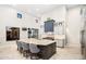 Gourmet kitchen with large island, stainless steel appliances, and ample counter space at 18610 W Porter Dr # 93, Goodyear, AZ 85338