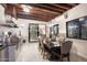 Covered outdoor kitchen and dining area with stainless steel appliances at 18610 W Porter Dr # 93, Goodyear, AZ 85338