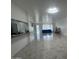 Spacious living room with tile floors and lots of natural light at 4232 W Citrus Way, Phoenix, AZ 85019