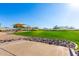 Community playground with shade structure and grassy area at 7788 W Lone Cactus Dr, Peoria, AZ 85382