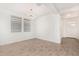 Elegant dining room with modern chandelier and tile floors at 15298 W Linden St, Goodyear, AZ 85338