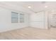 Spacious loft with wood-look flooring and recessed lighting at 15298 W Linden St, Goodyear, AZ 85338