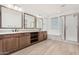 Elegant bathroom with double vanity, soaking tub, and shower at 15298 W Linden St, Goodyear, AZ 85338