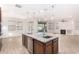 Island kitchen with granite countertops, stainless steel appliances, and recessed lighting at 15298 W Linden St, Goodyear, AZ 85338