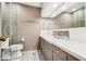 Modern bathroom with double vanity and walk-in shower at 113 E Palm Ln # B, Phoenix, AZ 85004