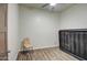 Simple bedroom with laminate flooring and a ceiling fan at 9023 N 3Rd Ave, Phoenix, AZ 85021