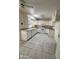 Kitchen with white cabinets and tile floor at 13407 N 109Th Ave, Sun City, AZ 85351