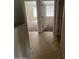 Clean hallway with tile flooring and access to bedrooms at 3030 S 102Nd Ln, Tolleson, AZ 85353