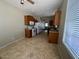 Well-lit kitchen, offering ample cabinet space and appliances at 3030 S 102Nd Ln, Tolleson, AZ 85353