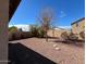 Small backyard with gravel and desert landscaping at 3030 S 102Nd Ln, Tolleson, AZ 85353