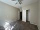 Spacious bedroom with a large closet and ceiling fan at 3030 S 102Nd Ln, Tolleson, AZ 85353