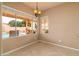Bright breakfast nook with pool view at 851 N Pineview Dr, Chandler, AZ 85226