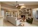 Spacious living room featuring a stone fireplace and built-in shelving at 851 N Pineview Dr, Chandler, AZ 85226