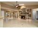 Open living room with a fireplace and built-in shelving at 851 N Pineview Dr, Chandler, AZ 85226