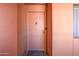 Condo entry with peach-colored door and welcome mat at 12222 N Paradise Village S Pkwy # 442, Phoenix, AZ 85032