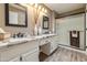 Double vanity bathroom with granite countertop and walk-in shower at 26226 S Flame Tree Dr, Sun Lakes, AZ 85248