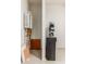Utility closet with water heater and water softener at 5526 S Grenoble St, Mesa, AZ 85212