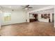Open living room with kitchen views and tile flooring at 5526 S Grenoble St, Mesa, AZ 85212